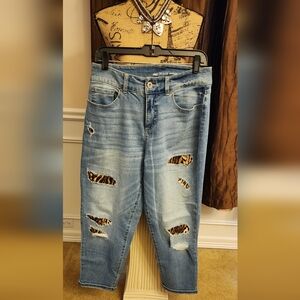 INC Boyfriend jeans with leopard print patches, size 8.